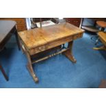 A Victorian mahogany games table