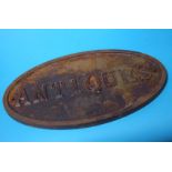 Cast iron 'Antiques' sign