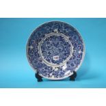 An Oriental blue and white plate