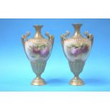A pair of Royal Worcester vases, decorated with gilding and roses, signed William Hart, puce mark,