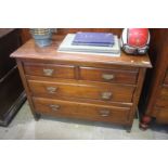 An Edwardian mahogany four drawer chest of drawers