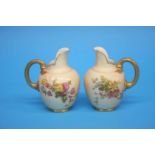 Two Royal Worcester flat back jugs, green printed marks, numbered 10/94. 11cm height