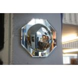 An octagonal decorative mirror