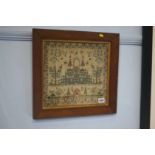 An oak framed sampler, dated April 1831.