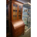 An Edwardian oak bureau bookcase