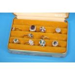 A box of ten decorative dress rings
