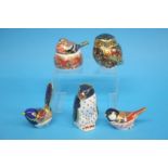 Five Royal Crown Derby paperweights, a 'Coal Tit', 'Rockhopper', 'Penguin', 'Nesting Chaffinch', '