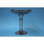 An EPNS pedestal tazza of Arts and Crafts design, the pierced bowl is supported on four stems,