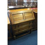 An oak fall front bureau