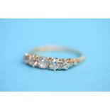 An 18ct gold old cut five stone diamond ring