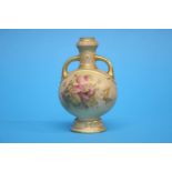 A small Royal Worcester vase, decorated with flowers, puce mark, numbered 1034. 9cm height