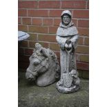 Garden figures; a monk and a horse's head