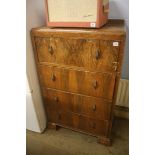 A walnut chest of drawers