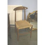 An oak chair with paper cord seat