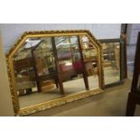 A copper framed mirror