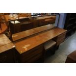 A teak dressing table and stool