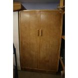 A limed oak wardrobe