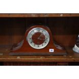 A mahogany mantle clock and 1 other