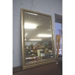 A gilt framed mirror