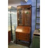 An oak bureau bookcase