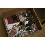 A box of assorted watches and jewellery