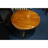 A reproduction mahogany coffee table