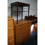 A modern chest of drawers and an occasional table