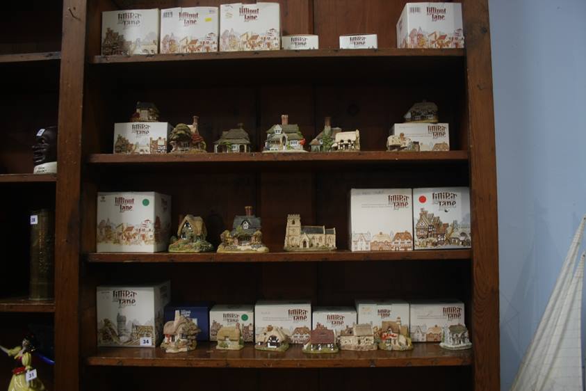A collection of Lilliput Lane cottages