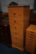 A tall modern chest of drawers