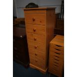 A tall modern chest of drawers