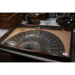 A mahogany cased lace fan