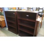 A pair of mahogany open bookcases