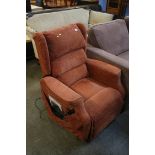 An electric reclining armchair