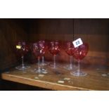 Six cranberry wine glasses