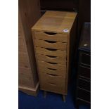 An oak eight drawer cabinet