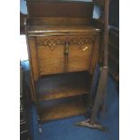 An oak bureau and a cheval mirror