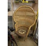 A cane peacock chair