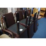 A set of six high back dining chairs