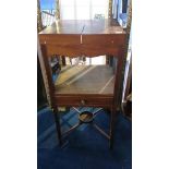 A mahogany fold over washstand