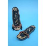 A pair of shoes, inlaid with mother of pearl