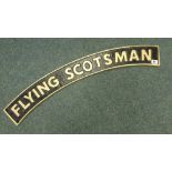 A cast 'Flying Scotsman' sign