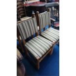 A set of four oak dining chairs