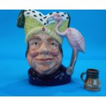 A Royal Doulton jug, 'The ugly Duchess' and a small jug