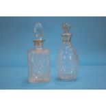 Two silver rimmed decanters