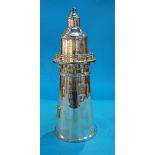 A large silver plated cocktail shaker, in the form of a lighthouse