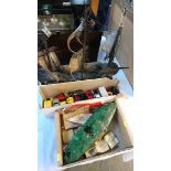 A malachite model boat, a box of toys and another boat