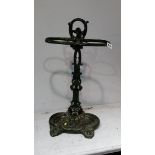 A metal ware umbrella stand