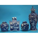 An Oriental blue and white china vase, two ginger jars and a tea caddy