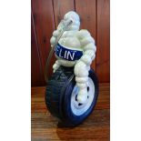A cast Michelin man figure