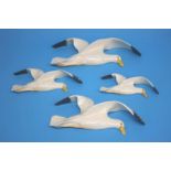 A group of four graduated Beswick seagulls wall plaques